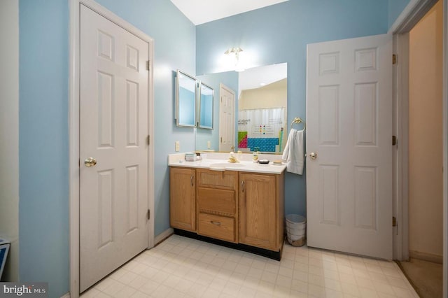 108 Harris Ct, Locust Grove, VA 22508 - full bath with vanity, tile patterned floors, and baseboards