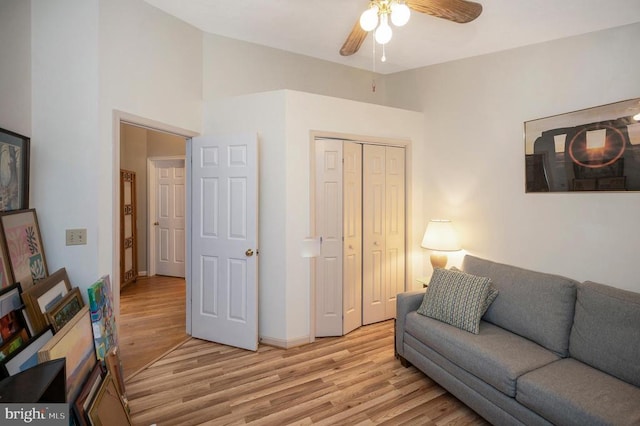 108 Harris Ct, Locust Grove, VA 22508 - living area with light wood finished floors, ceiling fan, baseboards, and vaulted ceiling