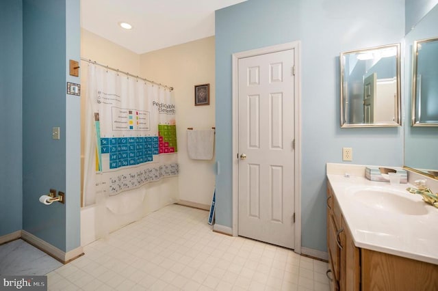 108 Harris Ct, Locust Grove, VA 22508 - bathroom featuring vanity, shower / bathtub combination with curtain, and baseboards