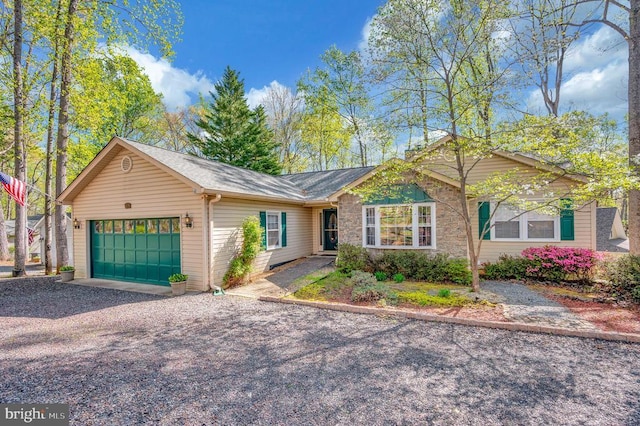 108 Harris Ct, Locust Grove, VA 22508 - single story home with an attached garage, gravel driveway, and stone siding