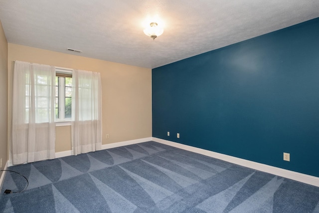 3417 Lake Pointe Dr, Rockingham, VA 22801 - spare room featuring dark carpet and baseboards