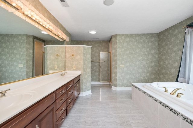 3417 Lake Pointe Dr, Rockingham, VA 22801 - bathroom with double vanity, a garden tub, tiled shower, and wallpapered walls