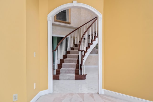 3417 Lake Pointe Dr, Rockingham, VA 22801 - stairs featuring tile patterned floors and arched walkways