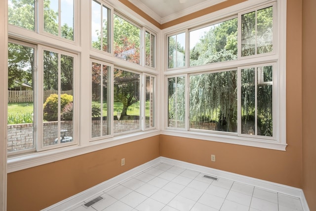 3417 Lake Pointe Dr, Rockingham, VA 22801 - unfurnished sunroom featuring plenty of natural light, tile patterned floors, and crown molding