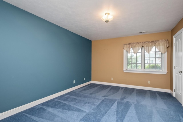 3417 Lake Pointe Dr, Rockingham, VA 22801 - empty room featuring baseboards and dark carpet