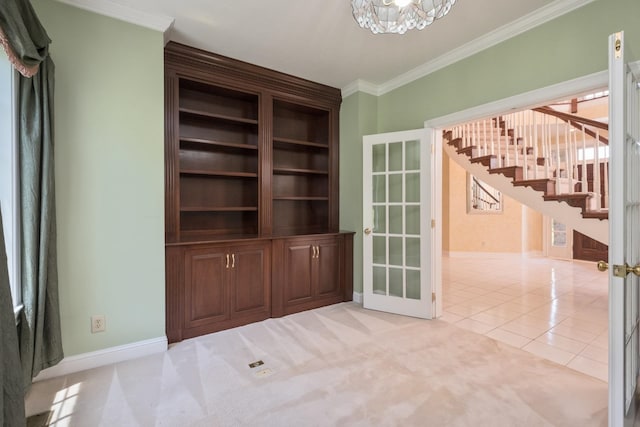 3417 Lake Pointe Dr, Rockingham, VA 22801 - unfurnished room featuring crown molding, stairway, a chandelier, light tile patterned floors, and french doors