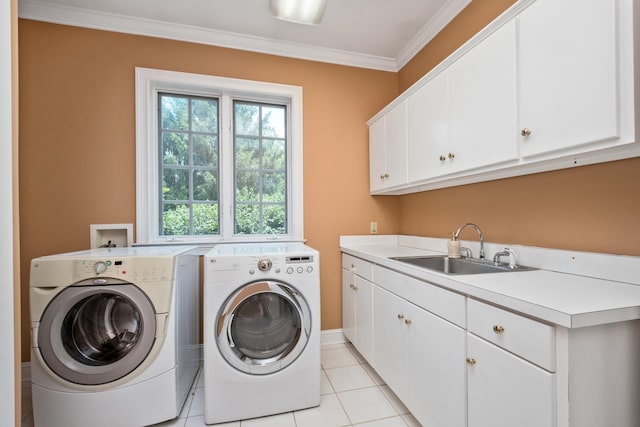 3417 Lake Pointe Dr, Rockingham, VA 22801 - laundry area with cabinet space, separate washer and dryer, ornamental molding, and light tile patterned flooring