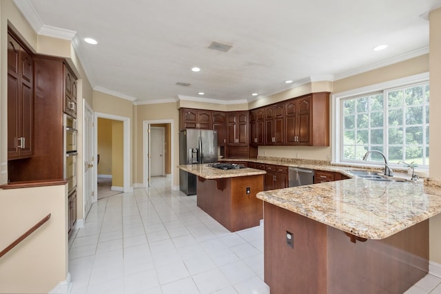 3417 Lake Pointe Dr, Rockingham, VA 22801 - kitchen with stainless steel appliances, a kitchen bar, a peninsula, light stone counters, and light tile patterned floors