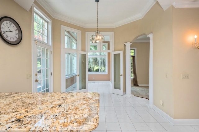 3417 Lake Pointe Dr, Rockingham, VA 22801 - unfurnished bedroom featuring ornate columns, light tile patterned flooring, ornamental molding, arched walkways, and a chandelier