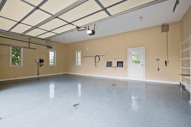3417 Lake Pointe Dr, Rockingham, VA 22801 - garage featuring a garage door opener and baseboards