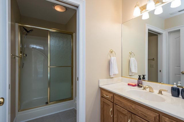 3417 Lake Pointe Dr, Rockingham, VA 22801 - bathroom featuring vanity, a shower stall, and tile patterned floors