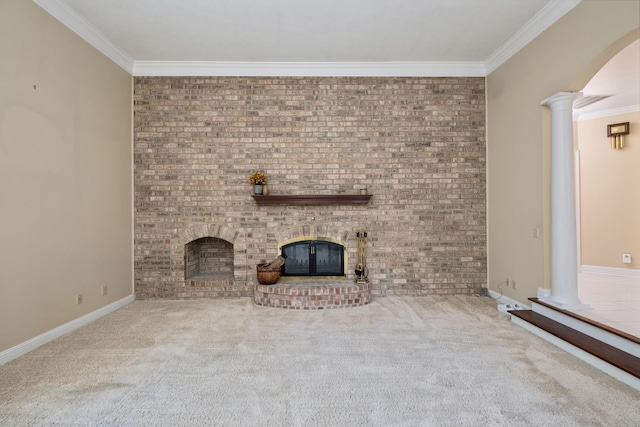 3417 Lake Pointe Dr, Rockingham, VA 22801 - unfurnished living room featuring a fireplace, ornate columns, ornamental molding, carpet floors, and arched walkways