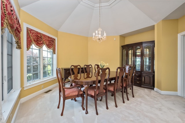 3417 Lake Pointe Dr, Rockingham, VA 22801 - dining space featuring a chandelier, light carpet, and lofted ceiling