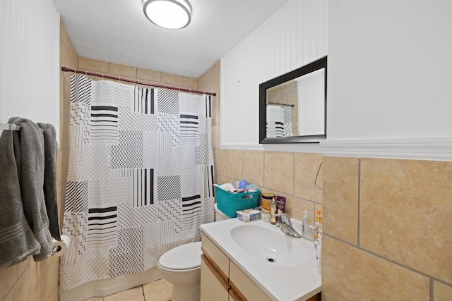 608 Hawkins St, Harrisonburg, VA 22801 - bathroom featuring toilet, tile walls, vanity, and a shower with shower curtain