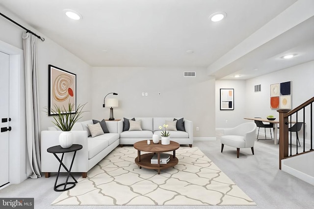 11207 Redlands Trl, Spotsylvania, VA 22551 - living area featuring light colored carpet, recessed lighting, stairs, and baseboards