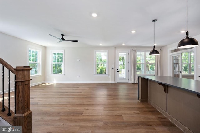 11207 Redlands Trl, Spotsylvania, VA 22551 - kitchen featuring ceiling fan, recessed lighting, wood finished floors, baseboards, and decorative light fixtures