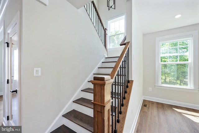 11207 Redlands Trl, Spotsylvania, VA 22551 - stairway featuring plenty of natural light, wood finished floors, baseboards, and recessed lighting