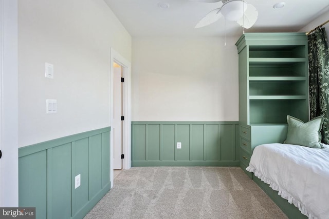 11207 Redlands Trl, Spotsylvania, VA 22551 - bedroom featuring a wainscoted wall, carpet flooring, a decorative wall, and ceiling fan