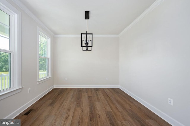 11207 Redlands Trl, Spotsylvania, VA 22551 - unfurnished dining area featuring a chandelier, dark wood-type flooring, ornamental molding, and baseboards