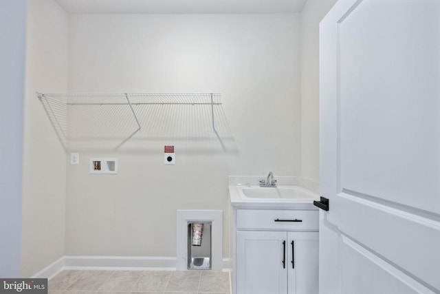 11207 Redlands Trl, Spotsylvania, VA 22551 - washroom with hookup for a washing machine, electric dryer hookup, baseboards, cabinet space, and light tile patterned flooring