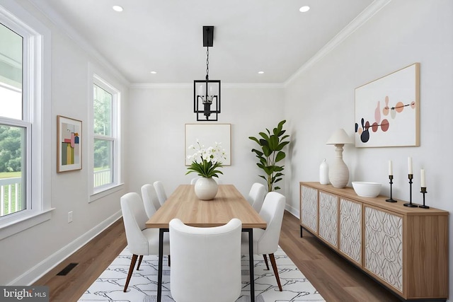 11207 Redlands Trl, Spotsylvania, VA 22551 - dining room with plenty of natural light, baseboards, crown molding, dark wood-style flooring, and recessed lighting