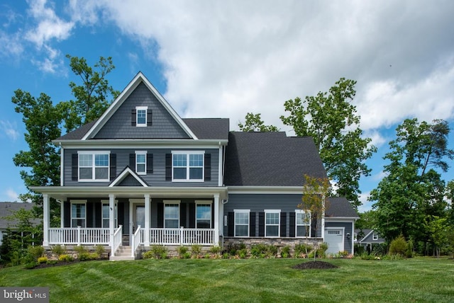 11207 Redlands Trl, Spotsylvania, VA 22551 - view of front of house featuring covered porch, a front yard, and stone siding