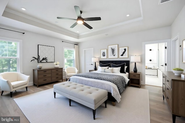 11207 Redlands Trl, Spotsylvania, VA 22551 - bedroom with a raised ceiling, multiple windows, light wood-style flooring, recessed lighting, and crown molding
