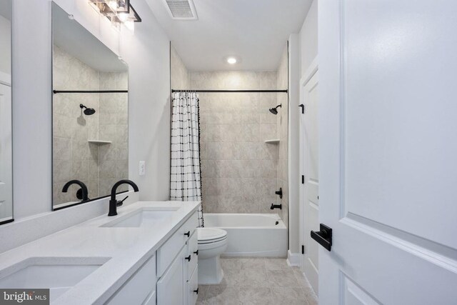 11207 Redlands Trl, Spotsylvania, VA 22551 - full bathroom with shower / tub combo with curtain, toilet, double vanity, and tile patterned floors