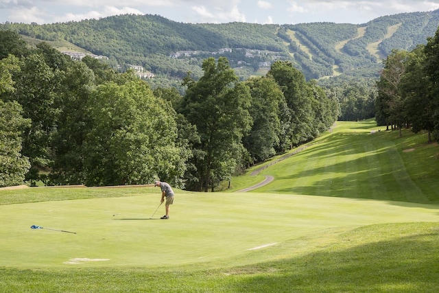 183 Deer Dr, Mcgaheysville, VA 22840 - surrounding community with view of golf course, a mountain view, and a lawn