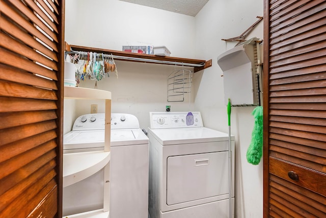 183 Deer Dr, Mcgaheysville, VA 22840 - laundry room with washing machine and clothes dryer and a textured ceiling