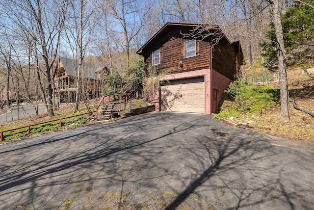183 Deer Dr, Mcgaheysville, VA 22840 - view of home's exterior with asphalt driveway and an attached garage
