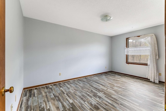 183 Deer Dr, Mcgaheysville, VA 22840 - empty room featuring wood finished floors and baseboards
