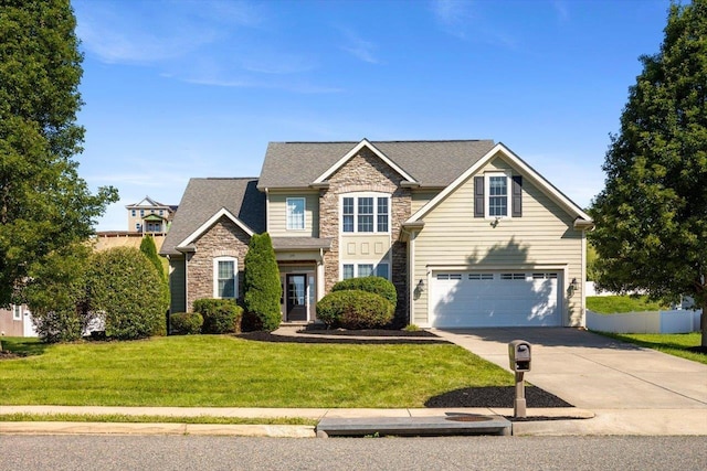 239 Windsor Dr, Fishersville, VA 22939 - view of front of house featuring stone siding, driveway, a garage, a front yard, and a shingled roof