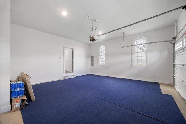 239 Windsor Dr, Fishersville, VA 22939 - garage featuring a garage door opener and electric panel