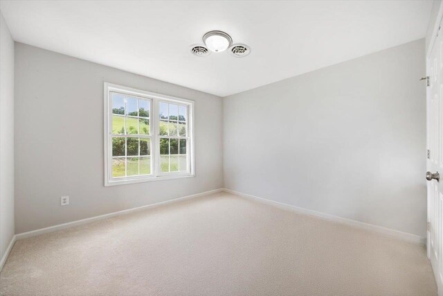 239 Windsor Dr, Fishersville, VA 22939 - unfurnished room with baseboards and light carpet
