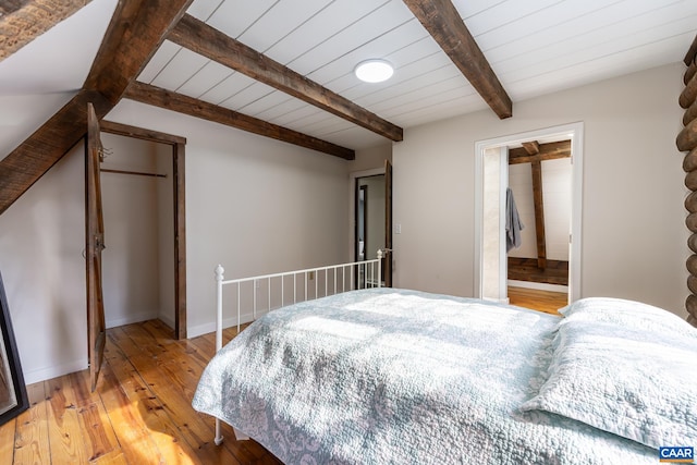 2395 Mountain Brook Dr, Charlottesville, VA 22902 - bedroom with wooden ceiling, light wood-type flooring, baseboards, and beamed ceiling