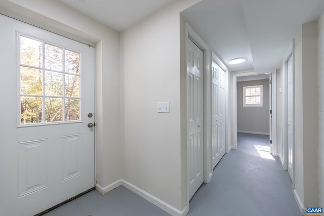 2395 Mountain Brook Dr, Charlottesville, VA 22902 - doorway with concrete flooring and baseboards