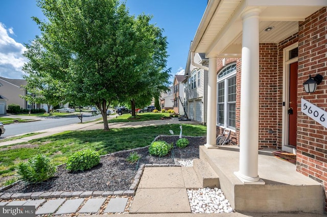 5606 Joshua Tree Cir, Fredericksburg, VA 22407 - view of yard with a residential view and covered porch