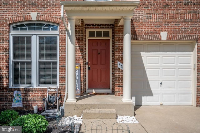 5606 Joshua Tree Cir, Fredericksburg, VA 22407 - entrance to property with brick siding, an attached garage, and concrete driveway