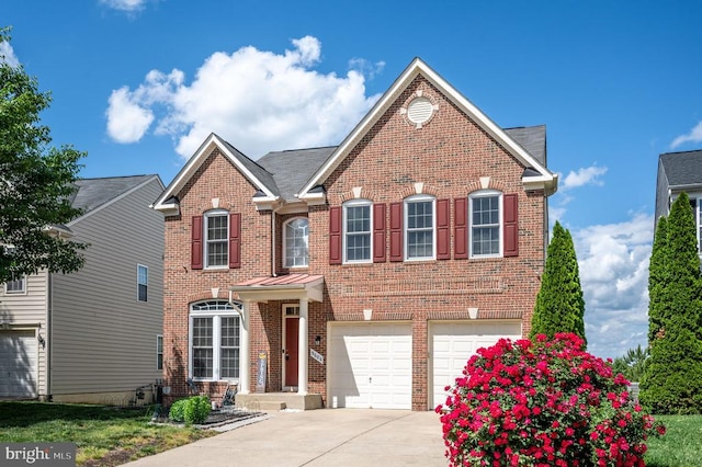 5606 Joshua Tree Cir, Fredericksburg, VA 22407 - view of front of property with brick siding, concrete driveway, and a garage