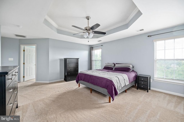 5606 Joshua Tree Cir, Fredericksburg, VA 22407 - bedroom featuring ornamental molding, a tray ceiling, light colored carpet, baseboards, and ceiling fan