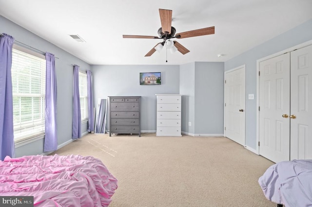 5606 Joshua Tree Cir, Fredericksburg, VA 22407 - bedroom featuring carpet, baseboards, ceiling fan, and a closet