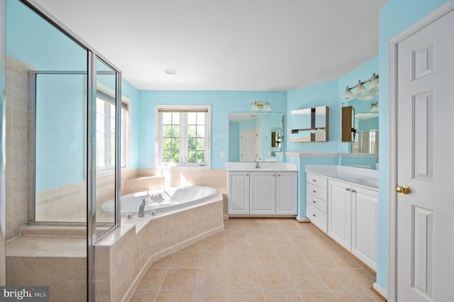 5606 Joshua Tree Cir, Fredericksburg, VA 22407 - full bathroom featuring a bath, tile patterned floors, vanity, and a stall shower