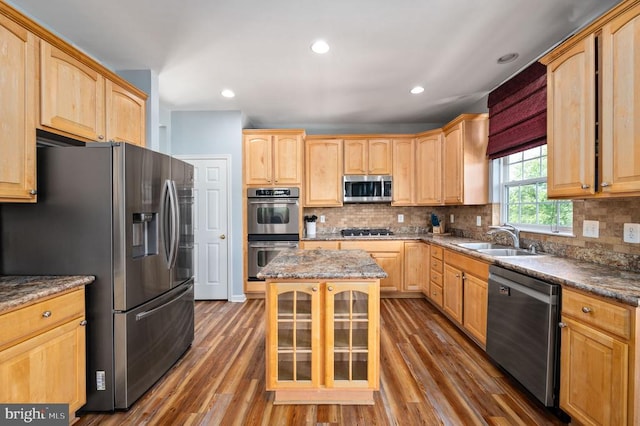 5606 Joshua Tree Cir, Fredericksburg, VA 22407 - kitchen featuring appliances with stainless steel finishes, a sink, light brown cabinetry, wood finished floors, and recessed lighting