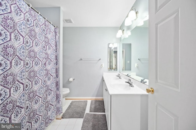 5606 Joshua Tree Cir, Fredericksburg, VA 22407 - bathroom featuring tile patterned floors, toilet, vanity, and a shower with shower curtain