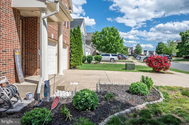 5606 Joshua Tree Cir, Fredericksburg, VA 22407 - view of yard with driveway and a garage