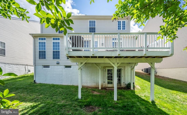 5606 Joshua Tree Cir, Fredericksburg, VA 22407 - back of house with a yard, central air condition unit, and a wooden deck