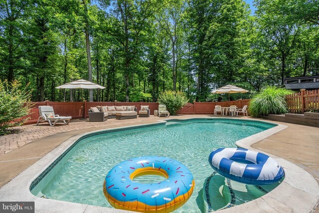 13013 Alum Springs Rd, Culpeper, VA 22701 - view of swimming pool featuring an outdoor living space, a patio area, and a fenced backyard