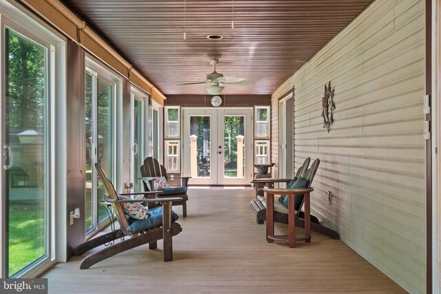 13013 Alum Springs Rd, Culpeper, VA 22701 - sunroom / solarium with french doors, ceiling fan, plenty of natural light, wooden walls, and wood ceiling