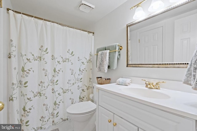 13013 Alum Springs Rd, Culpeper, VA 22701 - bathroom featuring vanity, toilet, and a shower with shower curtain